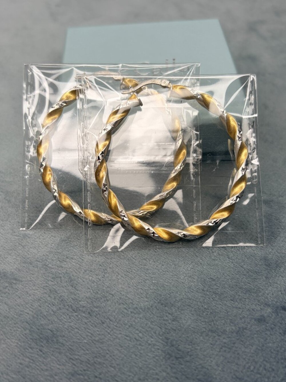 Gold-plated  925 sterling silver two-tone twisted hoop earrings
